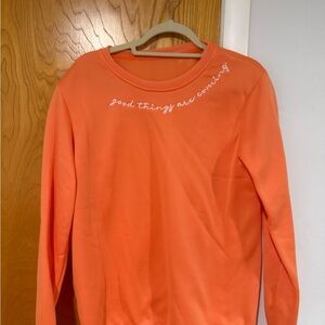 Orange Sweatshirt with Embroidered Text